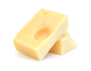 Cubes of cheddar cheese isolated on white 
