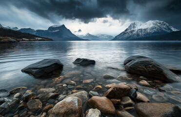 Obraz premium Breathtaking landscape of mountains and water under dark clouds