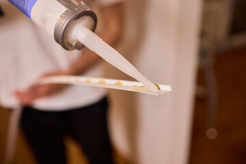 Applying adhesive to flexible material demands skill for a lasting, strong bond