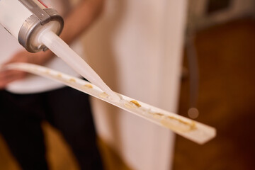 Applying adhesive to flexible material demands skill for a lasting, strong bond