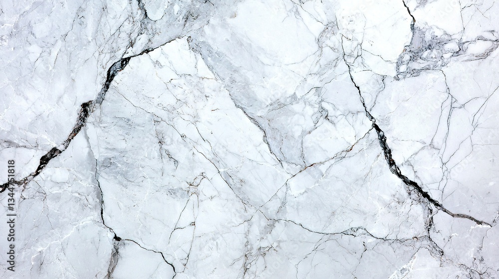 Poster a black and white design is visible on the top and bottom of this close-up image of a marbled surfac