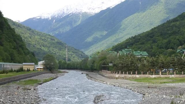Rosa Khutor embankment, mountains and river