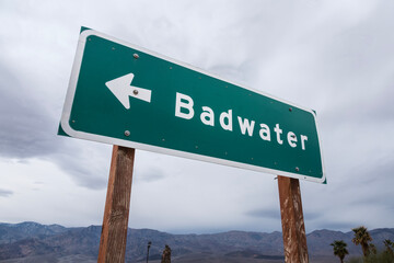 Badwater arrow highway sign in Death Valley National Park in California.  