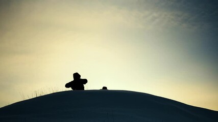 teamwork. concept of group travel to mountains of tourists. silhouette climbers man and woman against the sky with backpacks. silhouette happy people sunset. helping hand. joy happiness help friend - Powered by Adobe