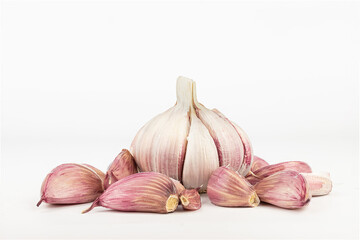 Purple garlic, allium sativum, foreground