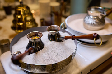 Traditional Coffee Brewing in a Stylish and Inviting Setting to Savor Its Rich Flavors