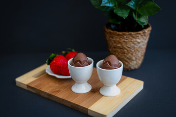 Easter Still Life with Chocolate Eggs and Strawberries