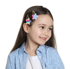 Happy little girl wearing beautiful hair accessories on white background
