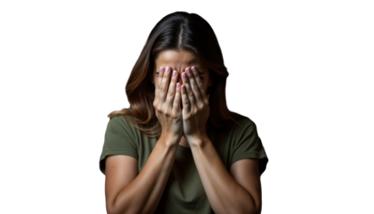Upset young woman covering her face with hands on a transparent background copy space
