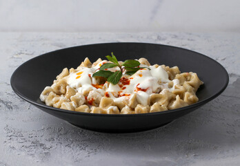 Traditional Turkish cuisine; Turkish ravioli, Turkish name; Kayseri Manti