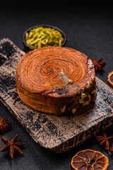 Round puff pastry croissant with pistachio filling or new york roll