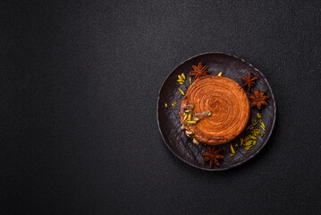 Round puff pastry croissant with pistachio filling or new york roll