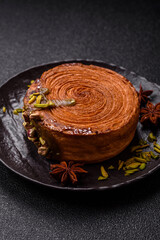 Round puff pastry croissant with pistachio filling or new york roll
