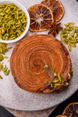 Round puff pastry croissant with pistachio filling or new york roll