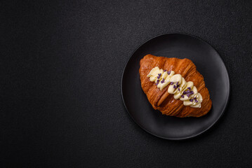 Sweet crispy fresh croissant with berry filling