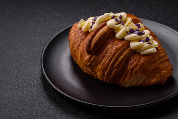 Sweet crispy fresh croissant with berry filling