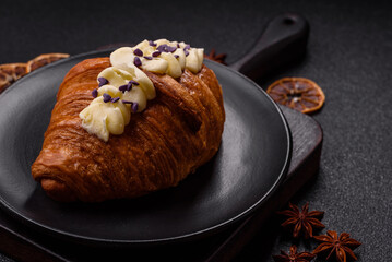 Sweet crispy fresh croissant with berry filling