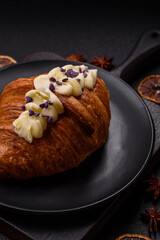 Sweet crispy fresh croissant with berry filling