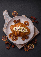 Sweet crispy fresh croissant with berry filling