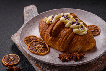 Sweet crispy fresh croissant with berry filling