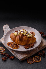 Sweet crispy fresh croissant with berry filling