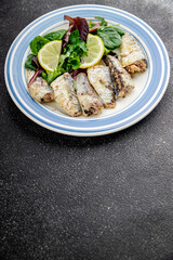 Sardine canned fish dish fresh delicious gourmet food background on table rustic food top view copy...