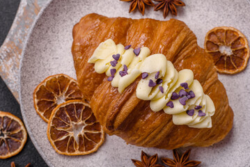 Sweet crispy fresh croissant with berry filling