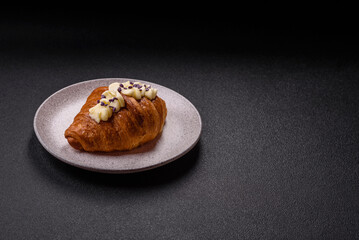 Sweet crispy fresh croissant with berry filling