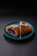 Sweet crispy fresh croissant with berry filling
