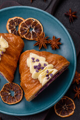Sweet crispy fresh croissant with berry filling