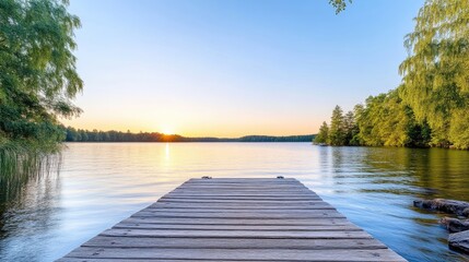 Serene lake sunset, wooden dock
