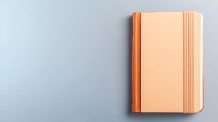 Beige Leather Bound Notebook On Light Grey Background