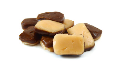 Caramel candies isolated on white background