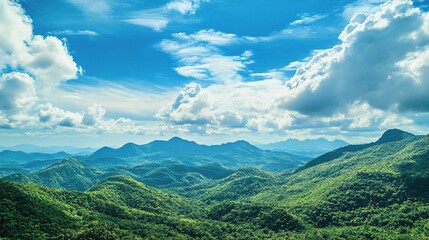 Breathtaking Scenic View of Lush Green Mountains Under Blue Sky