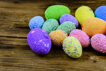 Easter eggs made of styrofoam on a wooden background