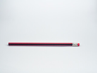 wooden pencil with rubber eraser tip isolated on white background