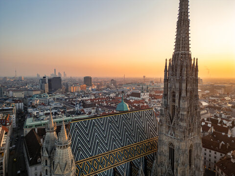 St. Stephen's Cathedral towering over Vienna at sunset, aerial view