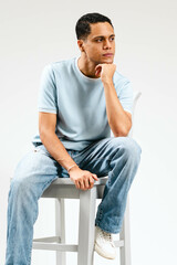 young man sitting on the floor