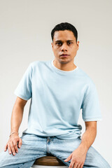 young man sitting on the floor