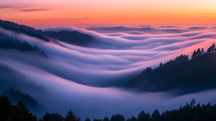 Serene misty valley at sunset with soft clouds rolling over hills, creating a tranquil atmosphere