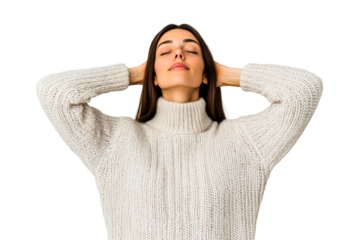 Woman relaxing in cozy sweater with hands on head