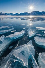 Frozen lake with cracked ice formations and mountains.