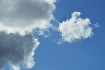 Cloudscape with Billowy White Clouds and Soft Blue Sky – Minimalist and Calm Nature Scene for Design Templates, Ads, or Relaxation Media