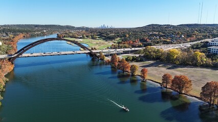 Lake Austin and the Pennybacker Bridge with colorful fall foliage