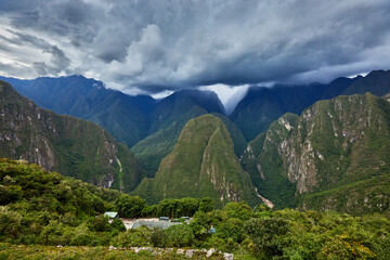 Rising through the morning mist, Putucusi stands tall across from the ancient citadel of Machu Picchu. A hidden gem amidst the Andean peaks, this sacred mountain offers a unique perspective..