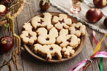 Linzer Easter cookie in the shape of animals on a plate on a table
