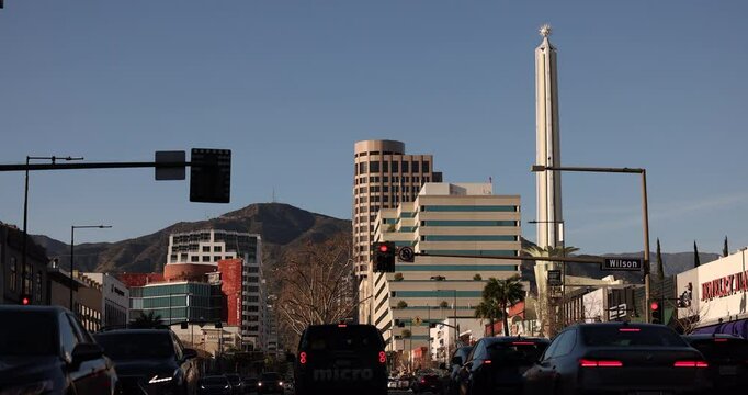 Glendale, California, USA - March 15, 2025: Afternoon traffic passes through the heart of downtown Glendale.