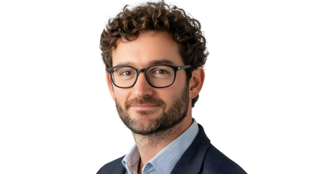 Professional Man with Glasses and Curly Hair Wearing a Suit Ideal for Business Corporate and