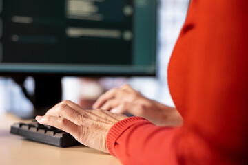 Online interaction with an AI chatbot system on a desktop pc, woman using technology evolution,...
