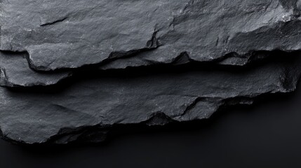 Dark grey slate layered stone texture